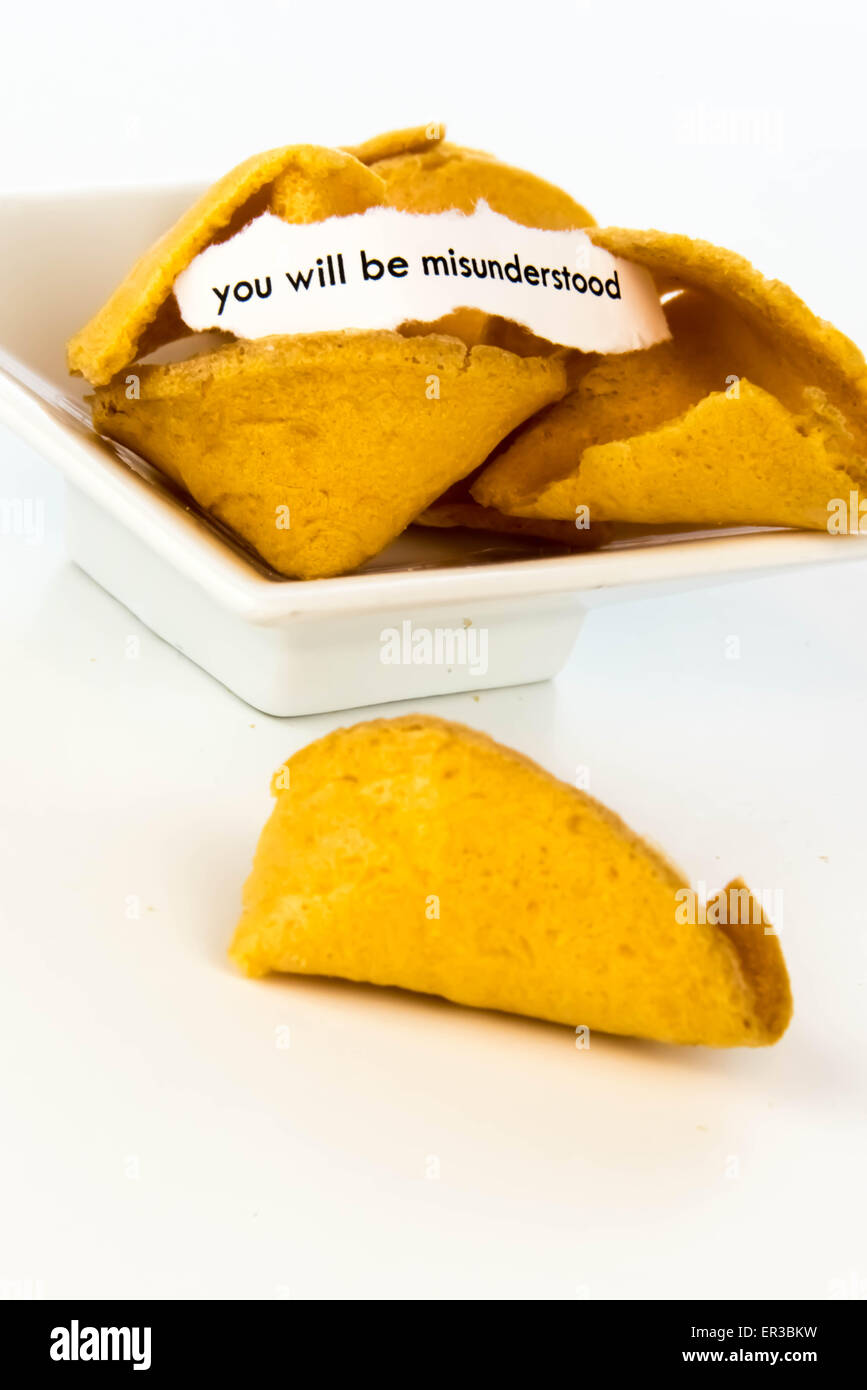 open fortune cookie with strip of white paper - YOU WILL BE ...