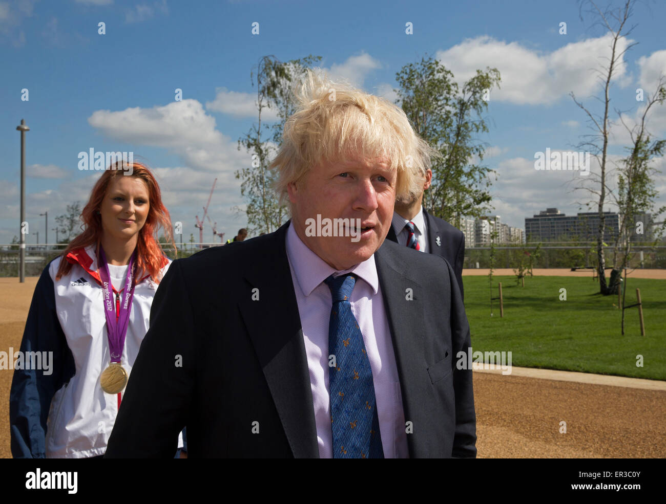 London Mayor Boris Johnson walks with Paralympic gold medallist Jessica ...