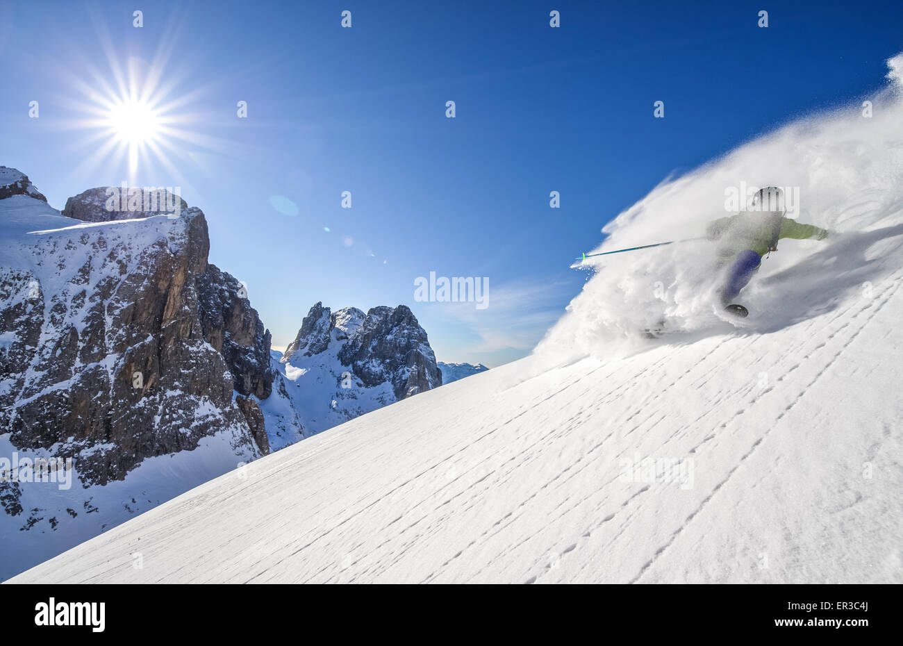 Man skiing off piste, Dolomites, Italy Stock Photo