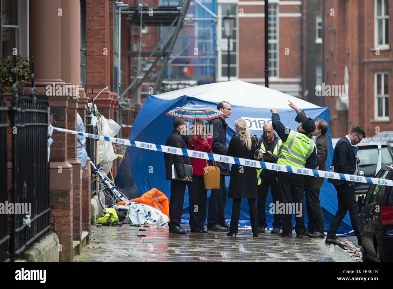A balcony collapse at Cadogan Square in Knightsbridge, West London has killed 2 men and injured at least 6 other people. District surveyors and a forensic team attend the scene.  Where: London, United Kingdom When: 21 Nov 2014 Credit: Mario Mitsis/WENN.com Stock Photo