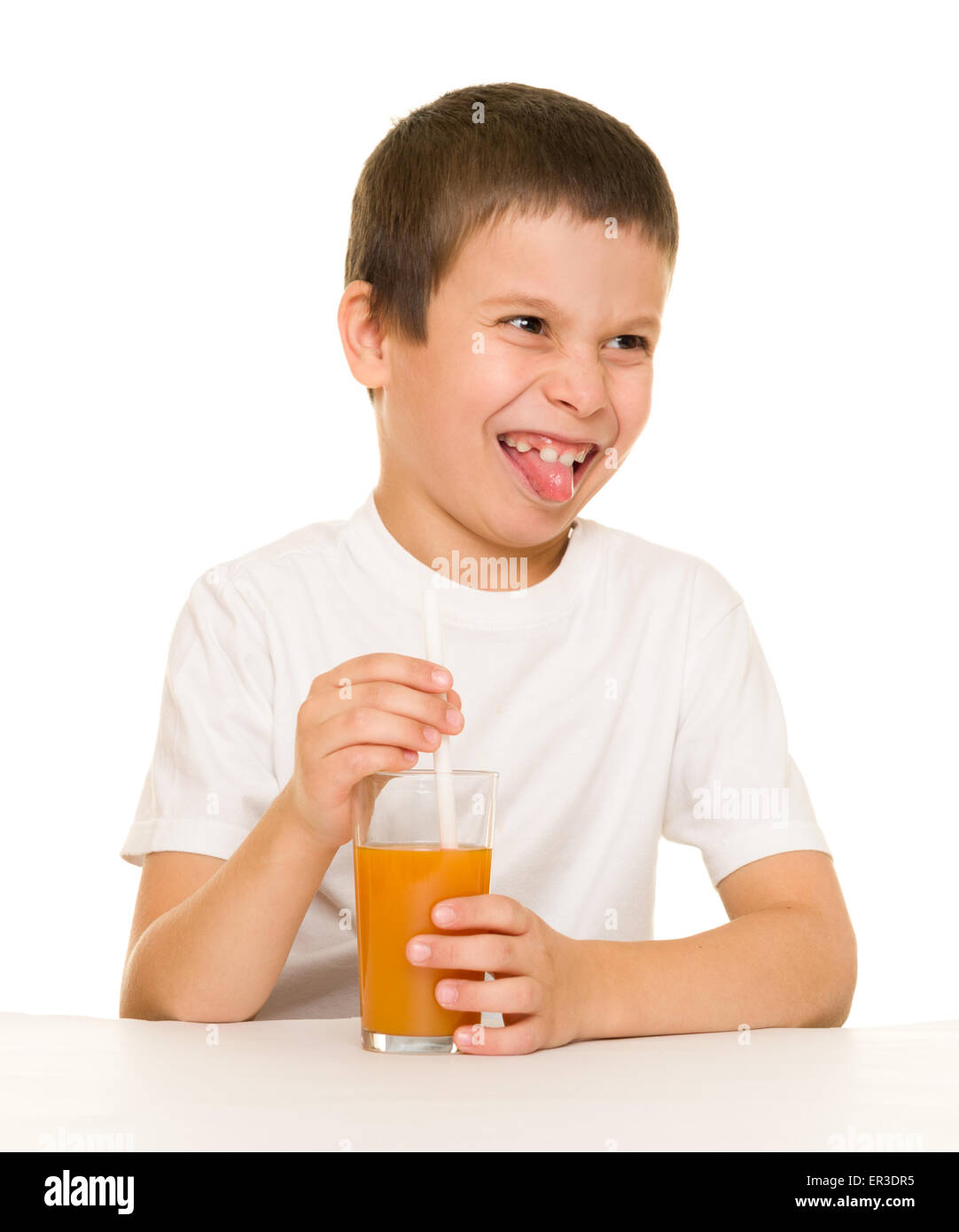boy drink orange juice with a straw Stock Photo