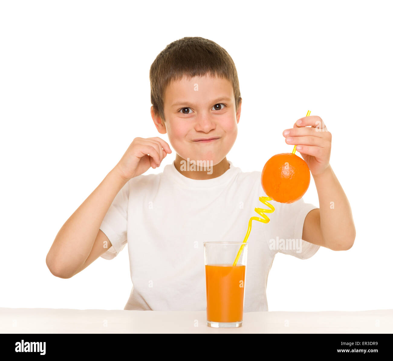 boy drink orange juice with a straw Stock Photo Alamy