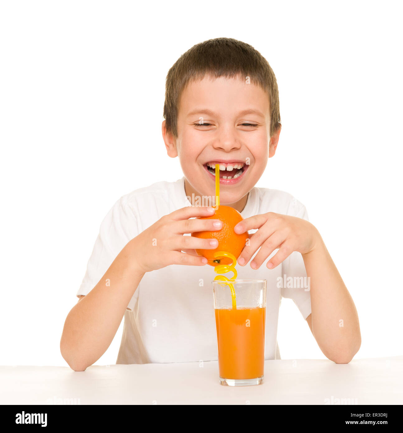 boy drink orange juice with a straw Stock Photo Alamy