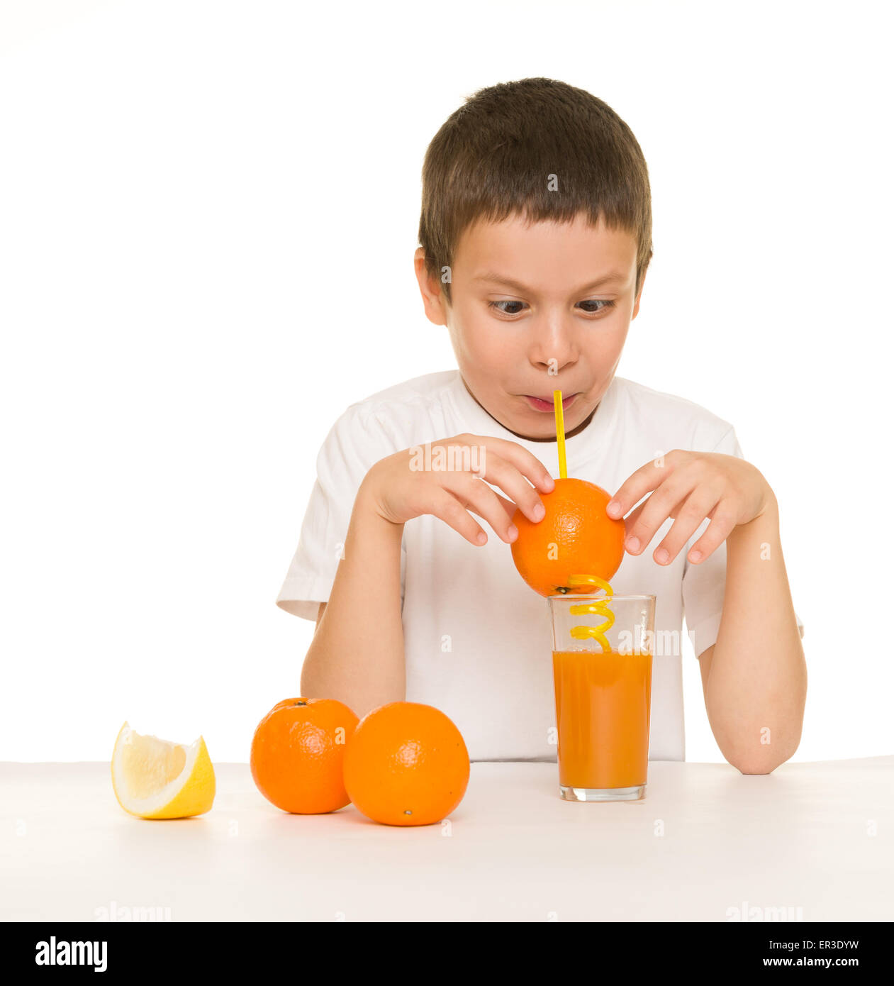 boy drink orange juice with a straw Stock Photo Alamy