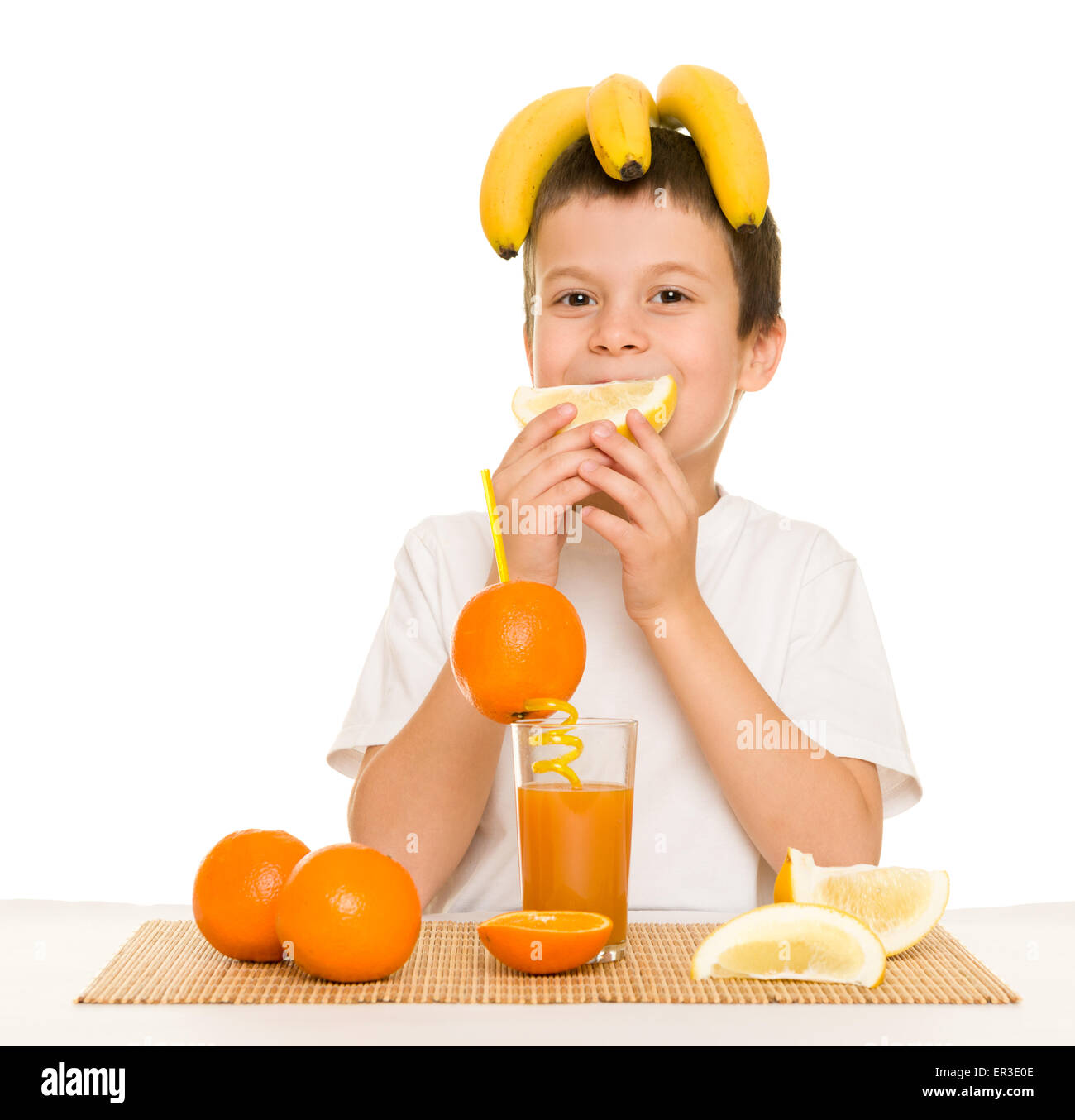 boy drink orange juice with a straw Stock Photo Alamy