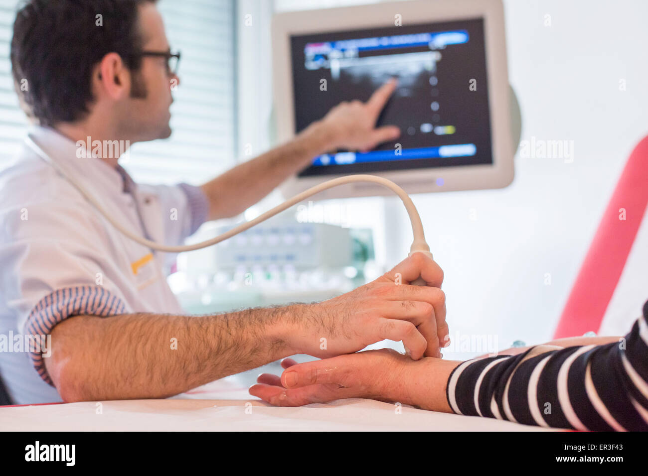 Hand Ultrasound of a patient with rheumatoid arthritis conducted by a