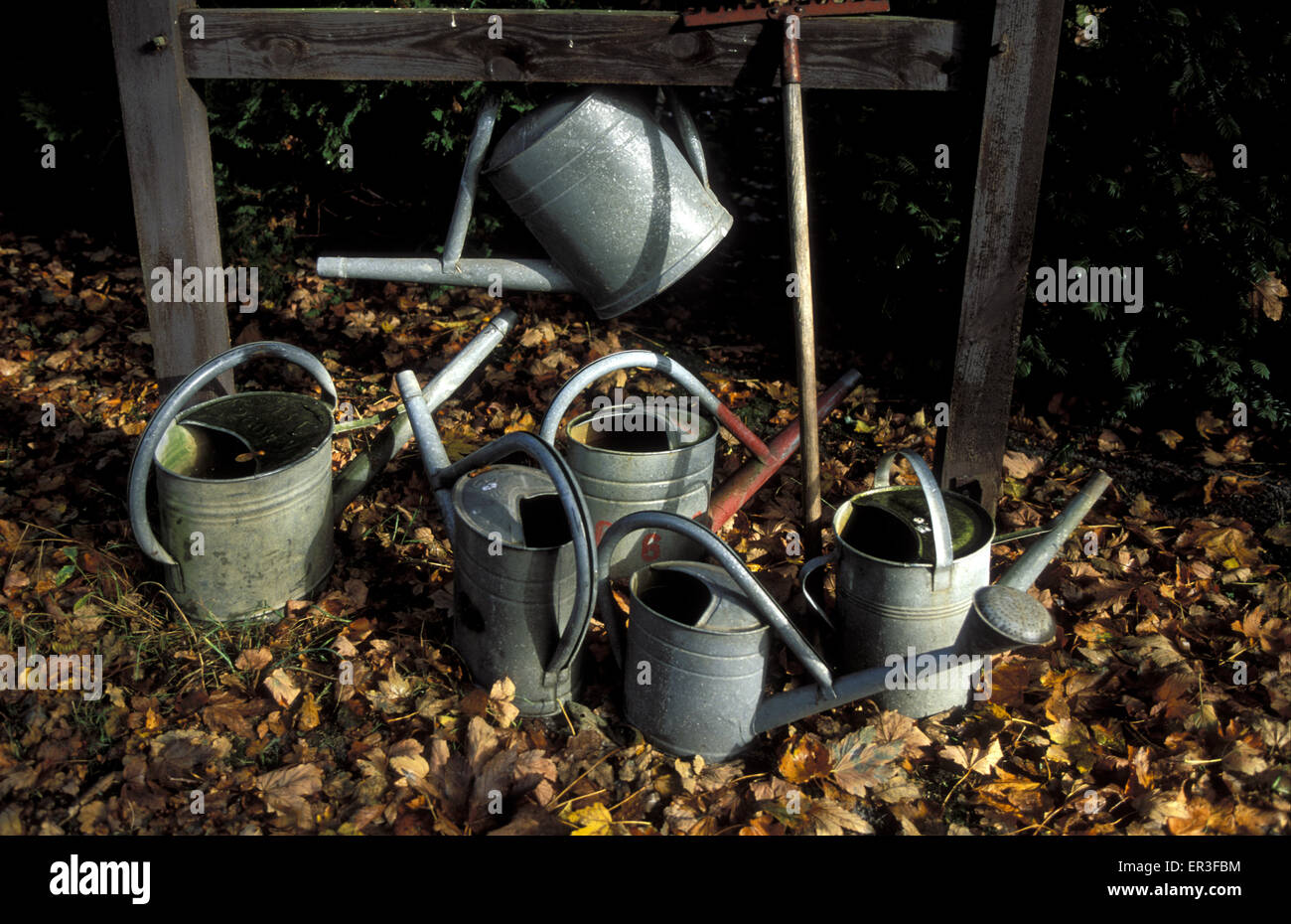 DEU, Germany, Mecklenburg-Western Pomerania, peninsula Darss, Prerow, watering cans at the churchyard.  DEU, Deutschland, Meckle Stock Photo