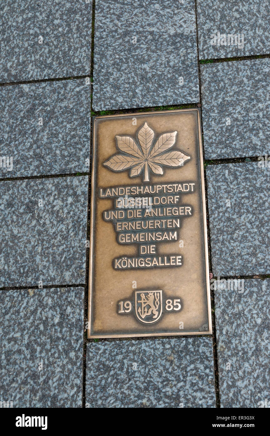 Brass plaque commemorating renovation of the Königsallee in Düsseldorf, Germany Stock Photo