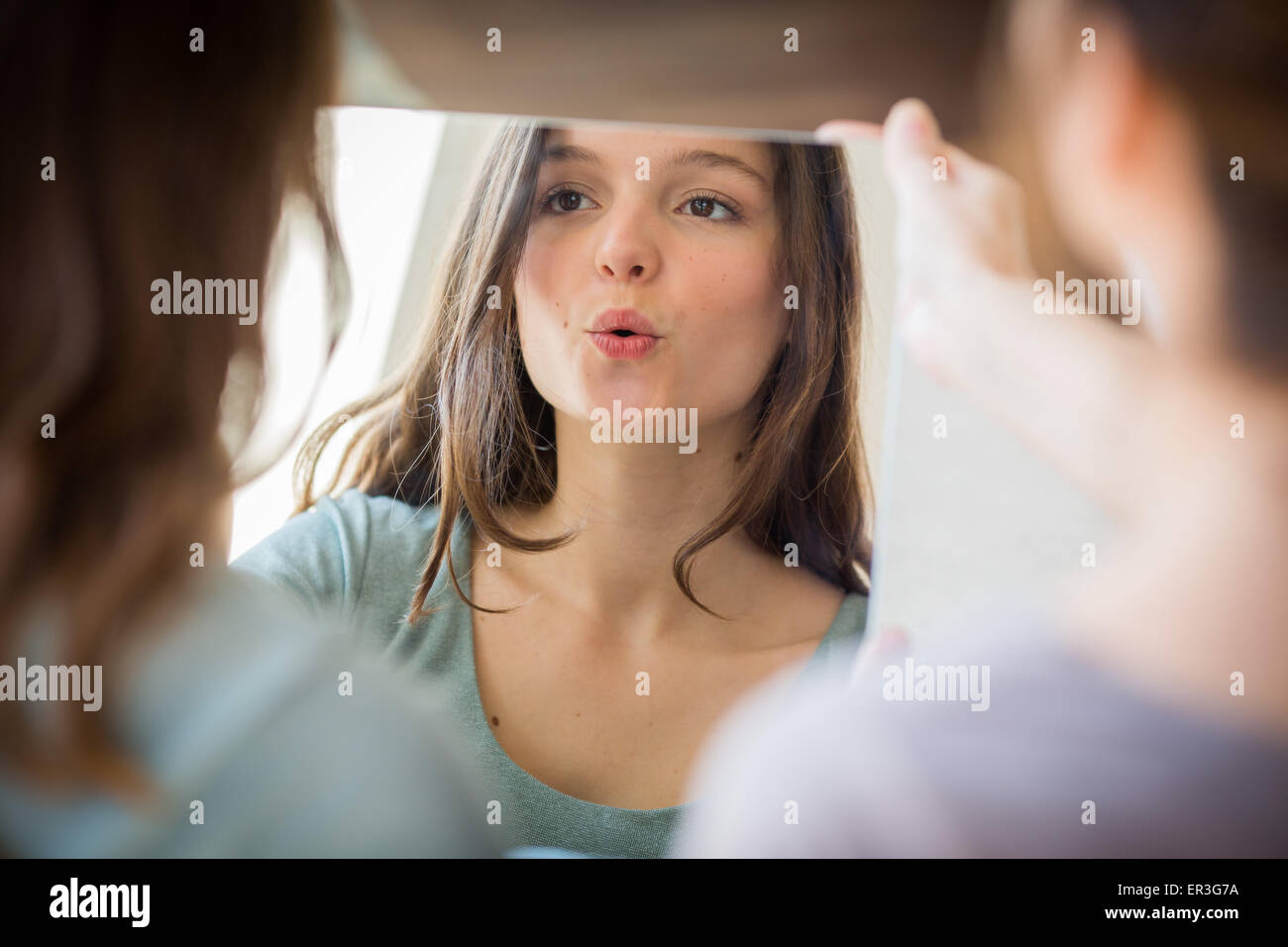 Treatment of stuttering : woman doing articulation and breathing exercises. Stock Photo