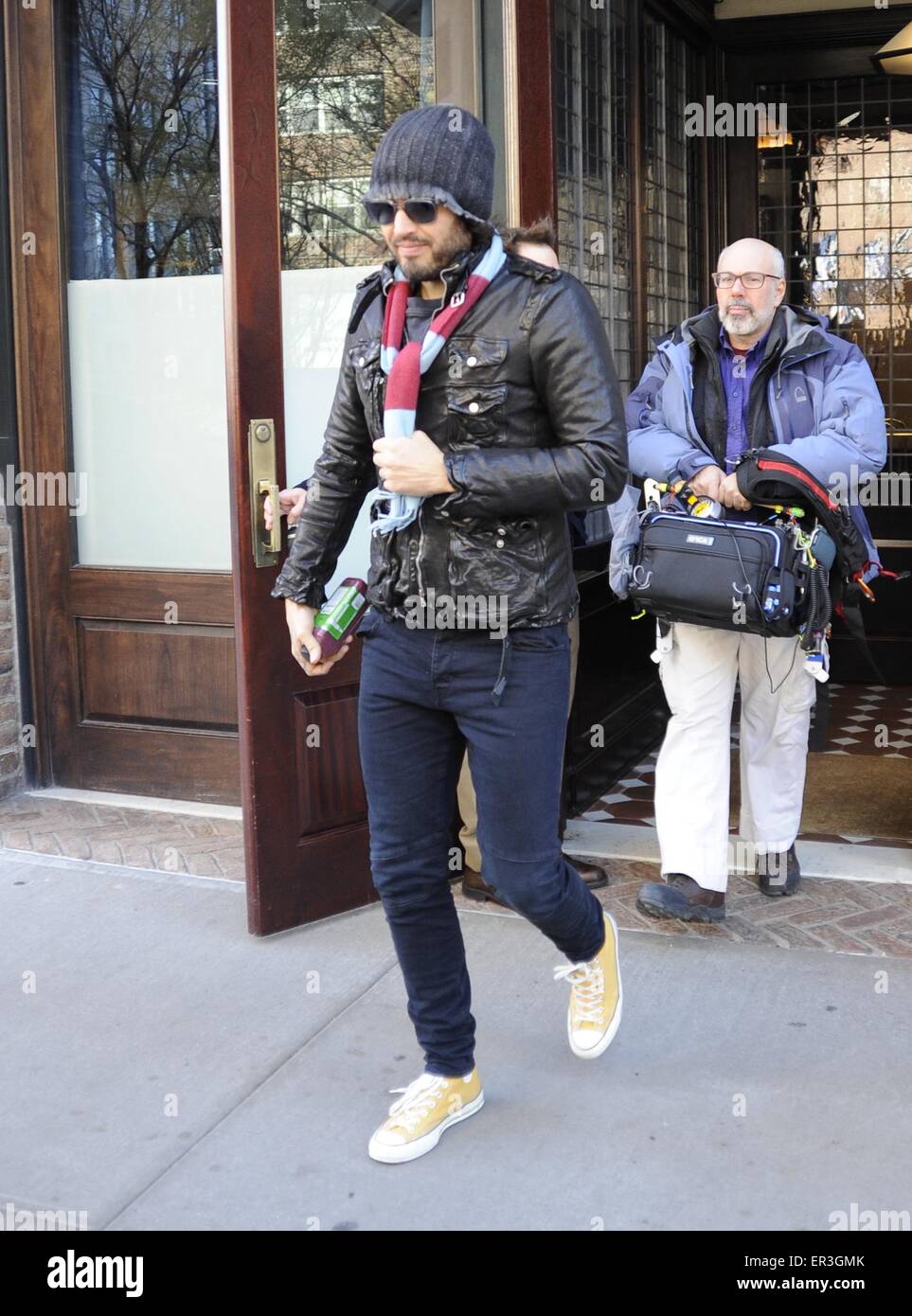 Russell Brand leaves The Greenwich Hotel in Manhattan wearing a claret and blue scarf made in the kit colours of his favourite football team, West Ham United  Featuring: Russell Brand Where: New York City, New York, United States When: 21 Nov 2014 Credit: TNYF/WENN.com Stock Photo