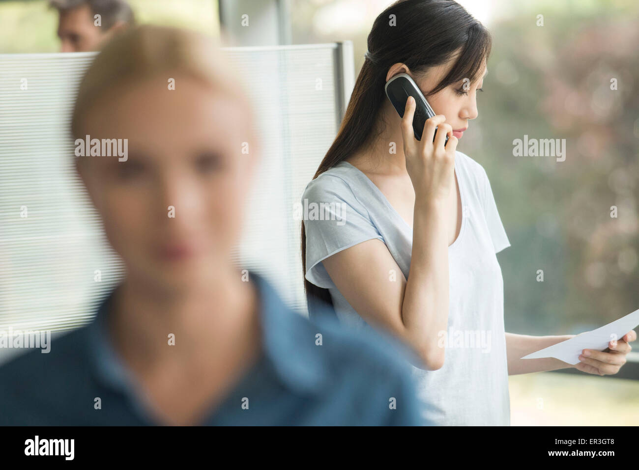 Office worker making phone call Stock Photo Alamy