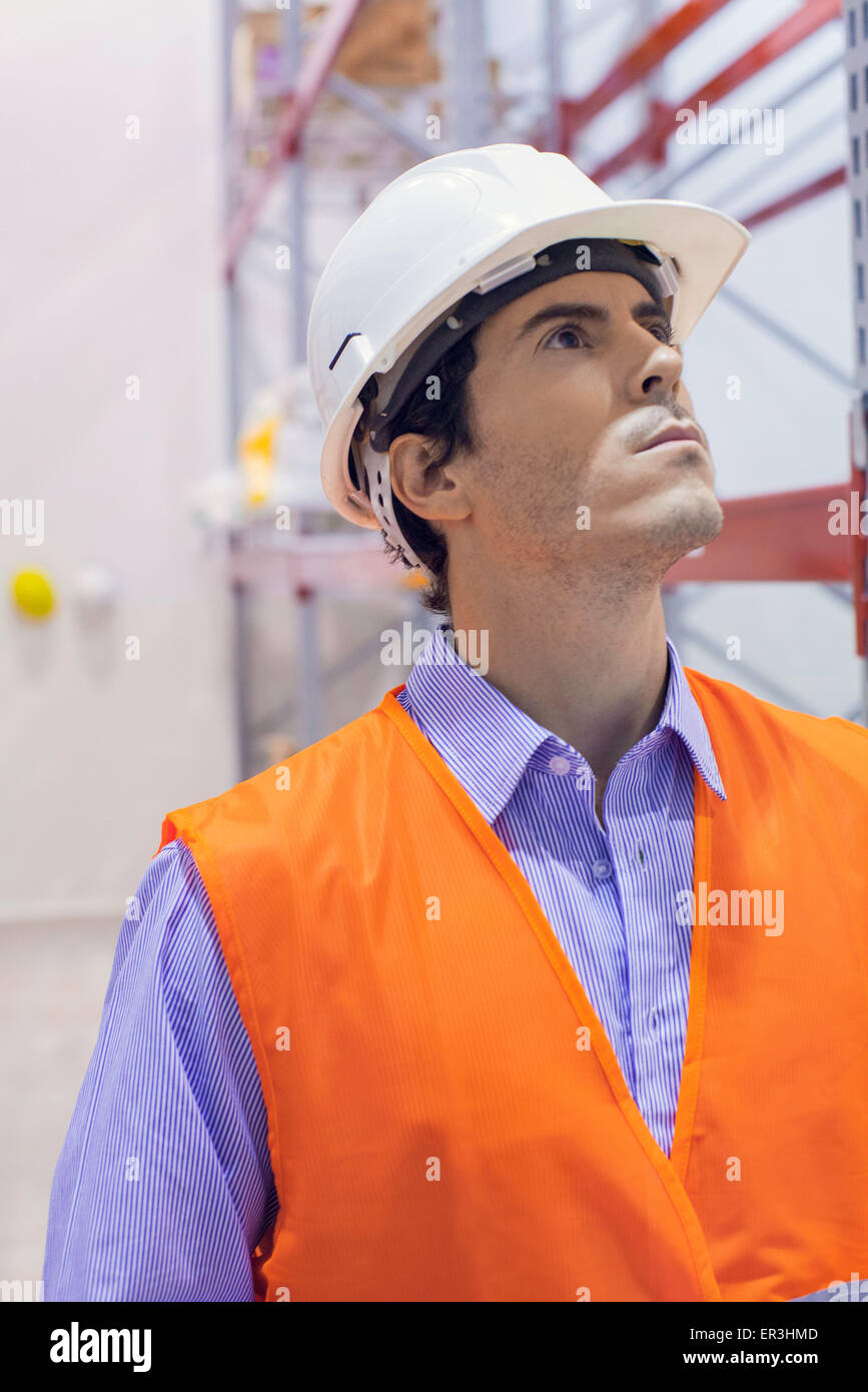 Technician inspecting industrial plant Stock Photo