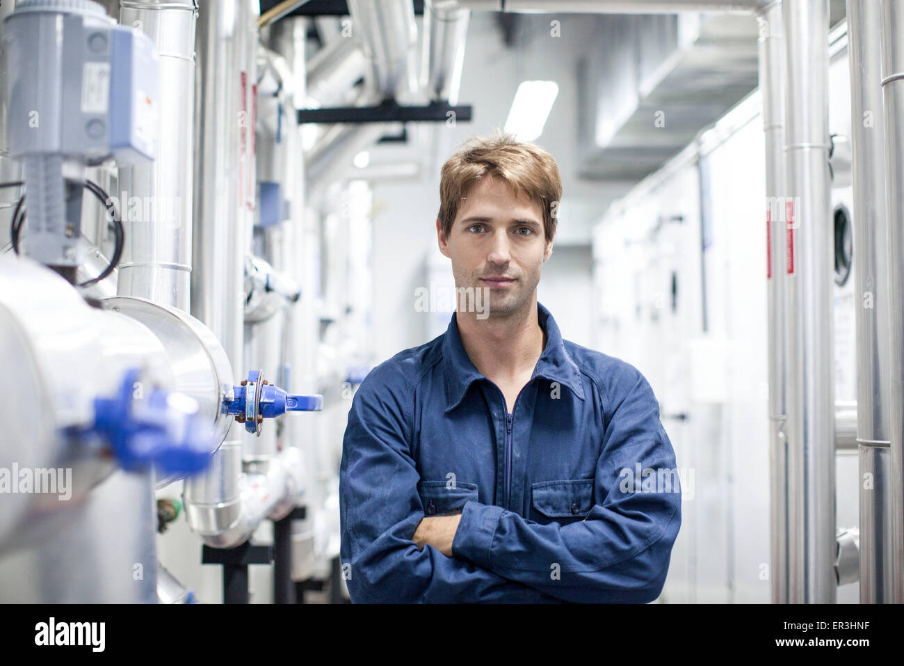 Skilled worker in industrial plant, portrait Stock Photo