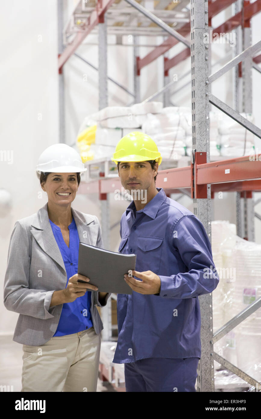 Engineers in warehouse, portrait Stock Photo