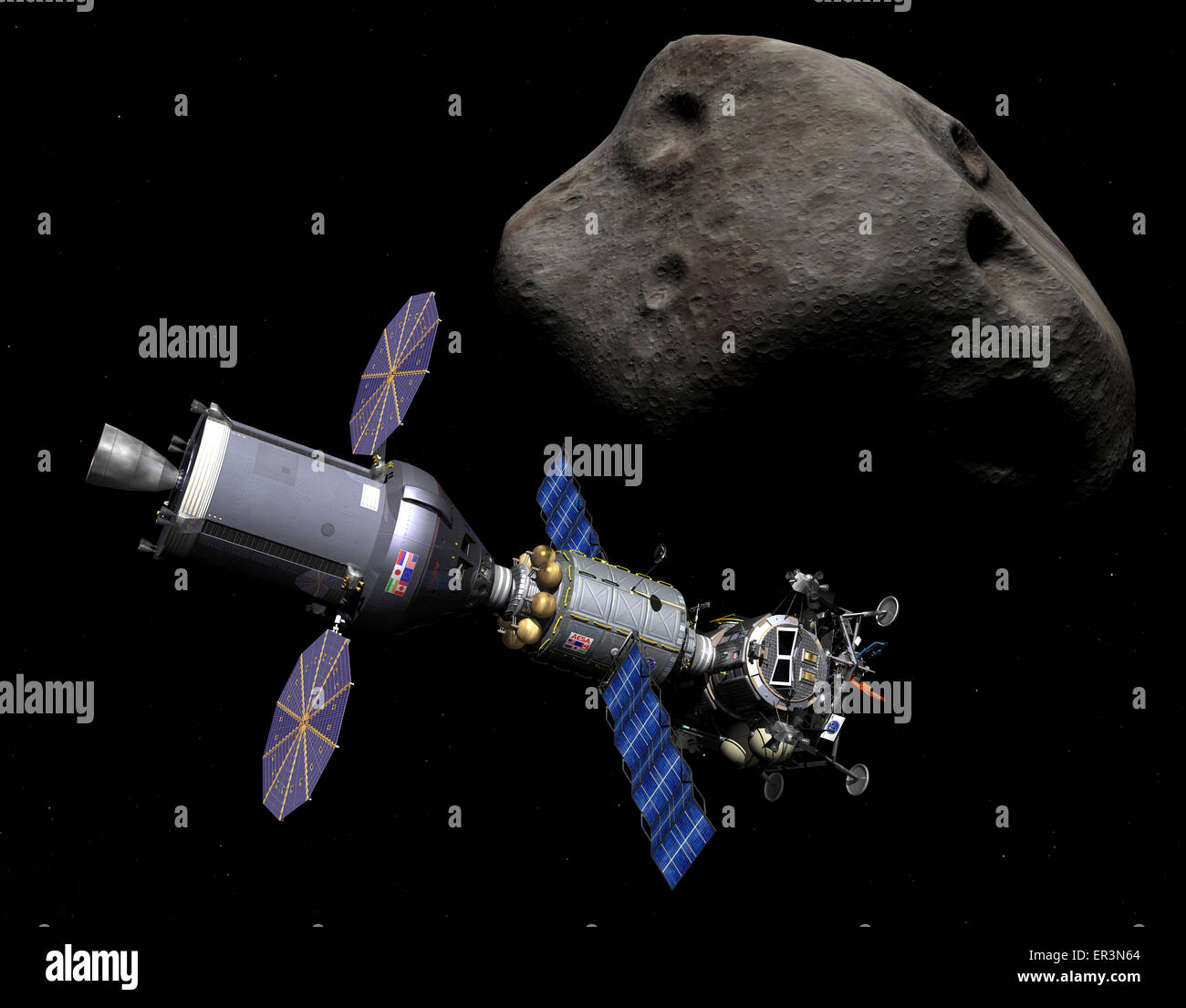 A manned Asteroid Lander is docked to a combination Deep Space Vehicle (DSV) and Extended Stay Module (ESM) on a mission to a de Stock Photo