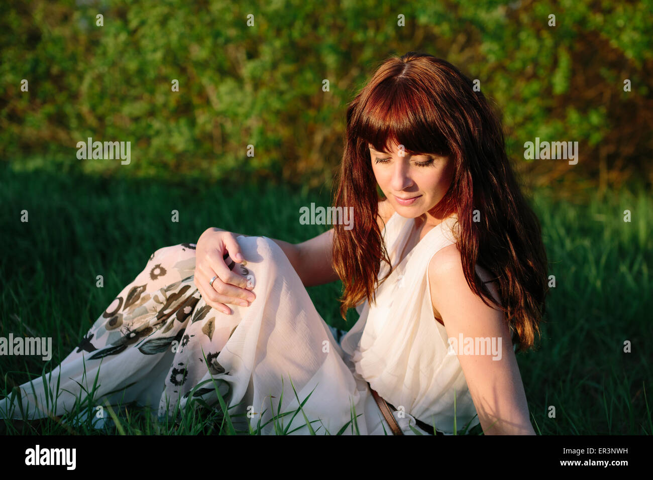 Beautiful girl in a white dress Stock Photo - Alamy