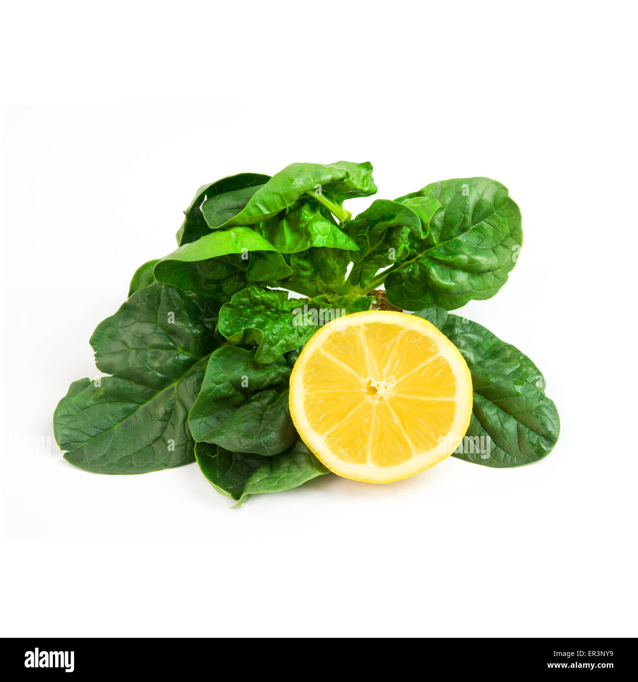 fresh green spinach isolated on white background Stock Photo - Alamy