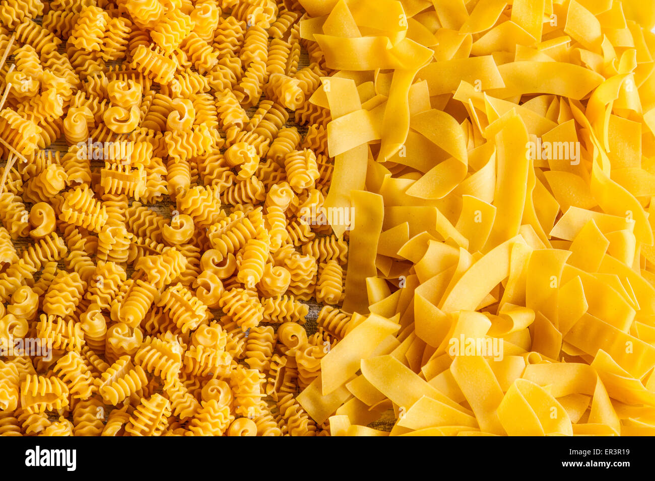 Variety of egg pasta background Stock Photo - Alamy