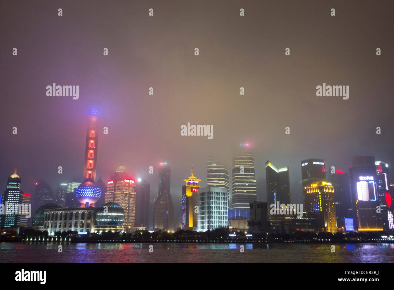 Pudong Skyline At Night In The Fog Across From Twin City Shanghai And Huangpu River China Stock Photo Alamy