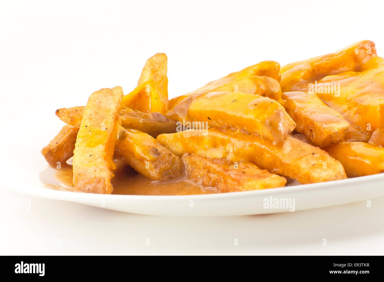 Hearty gravy and cheddar cheese disco fries Stock Photo Alamy