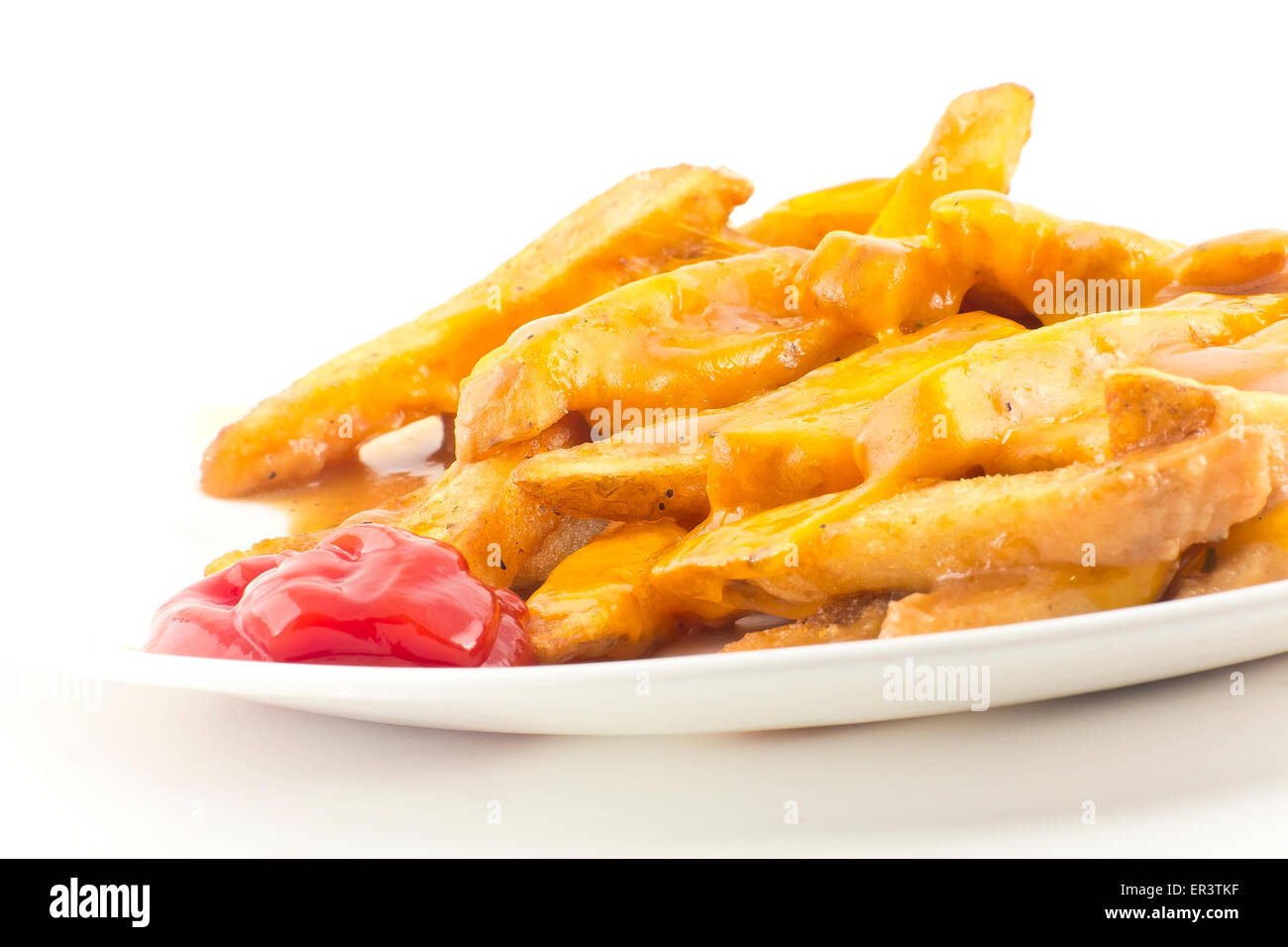 Hearty gravy and cheddar cheese disco fries Stock Photo Alamy