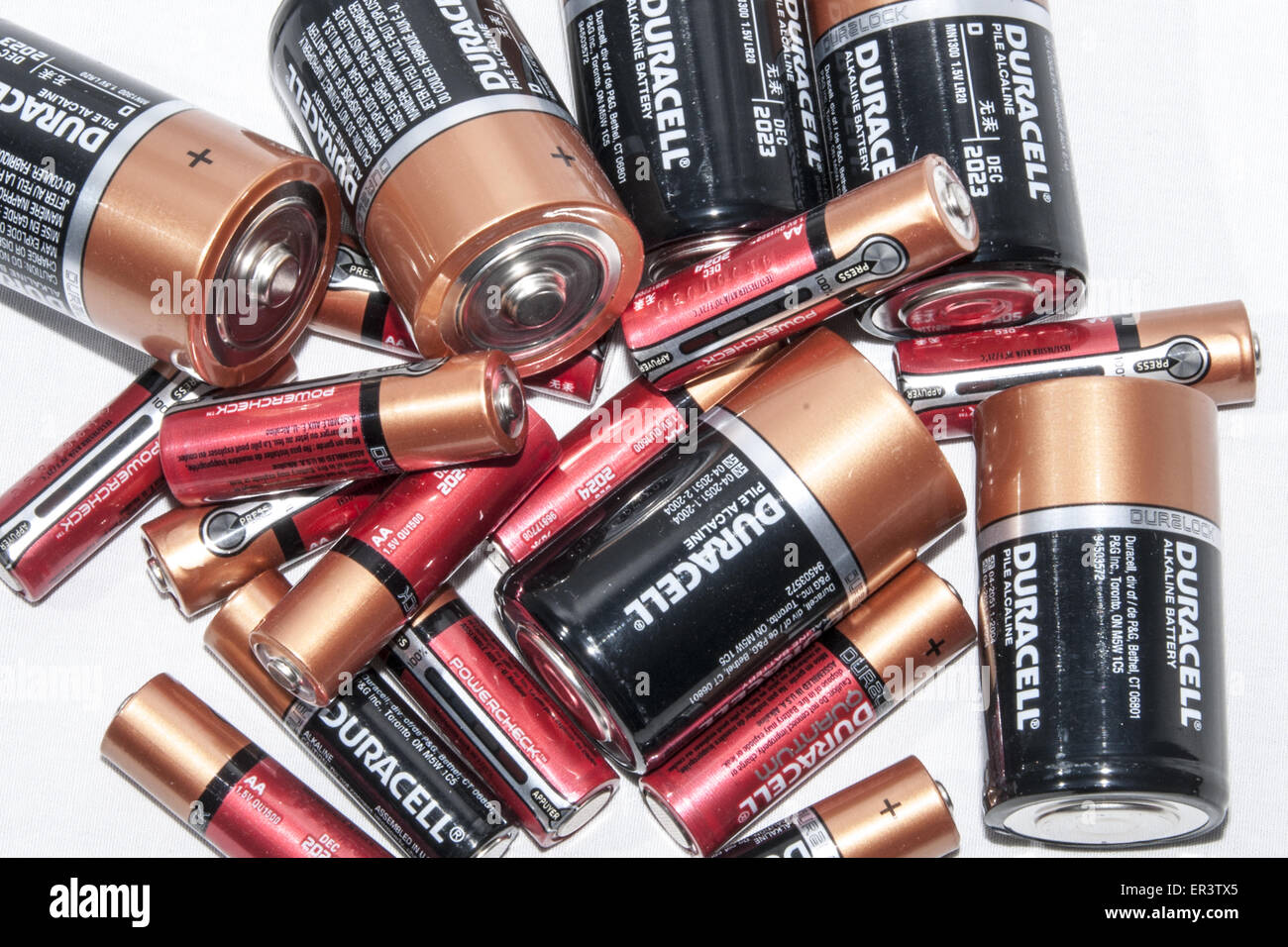 Pile of C and AA Duracell batteries on white background Stock Photo Alamy