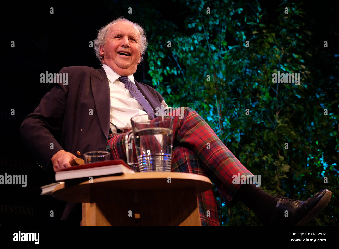 Hay Festival, Powys, Wales - May 2015  - Author Alexander McCall Smith enjoys a joke on stage at the Hay Festival as he talks about his many novels including his latest book Fatty O'Leary's Dinner Party. Stock Photo