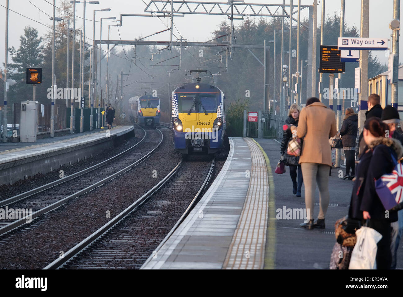 Train approaches Uphall Station in freezing fog Featuring Atmosphere