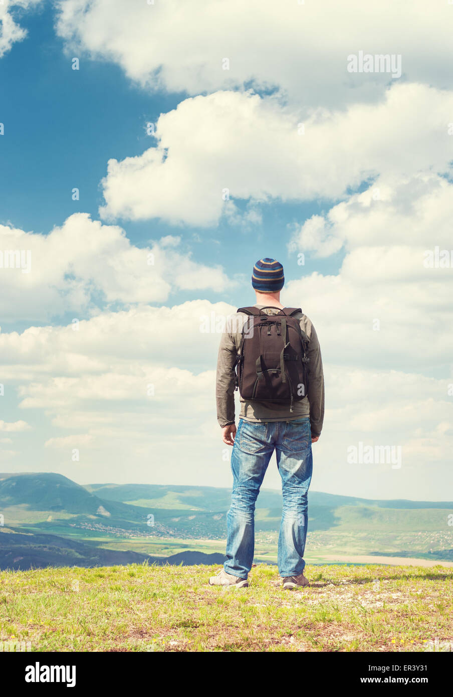 Hiker on top of the hill Stock Photo - Alamy