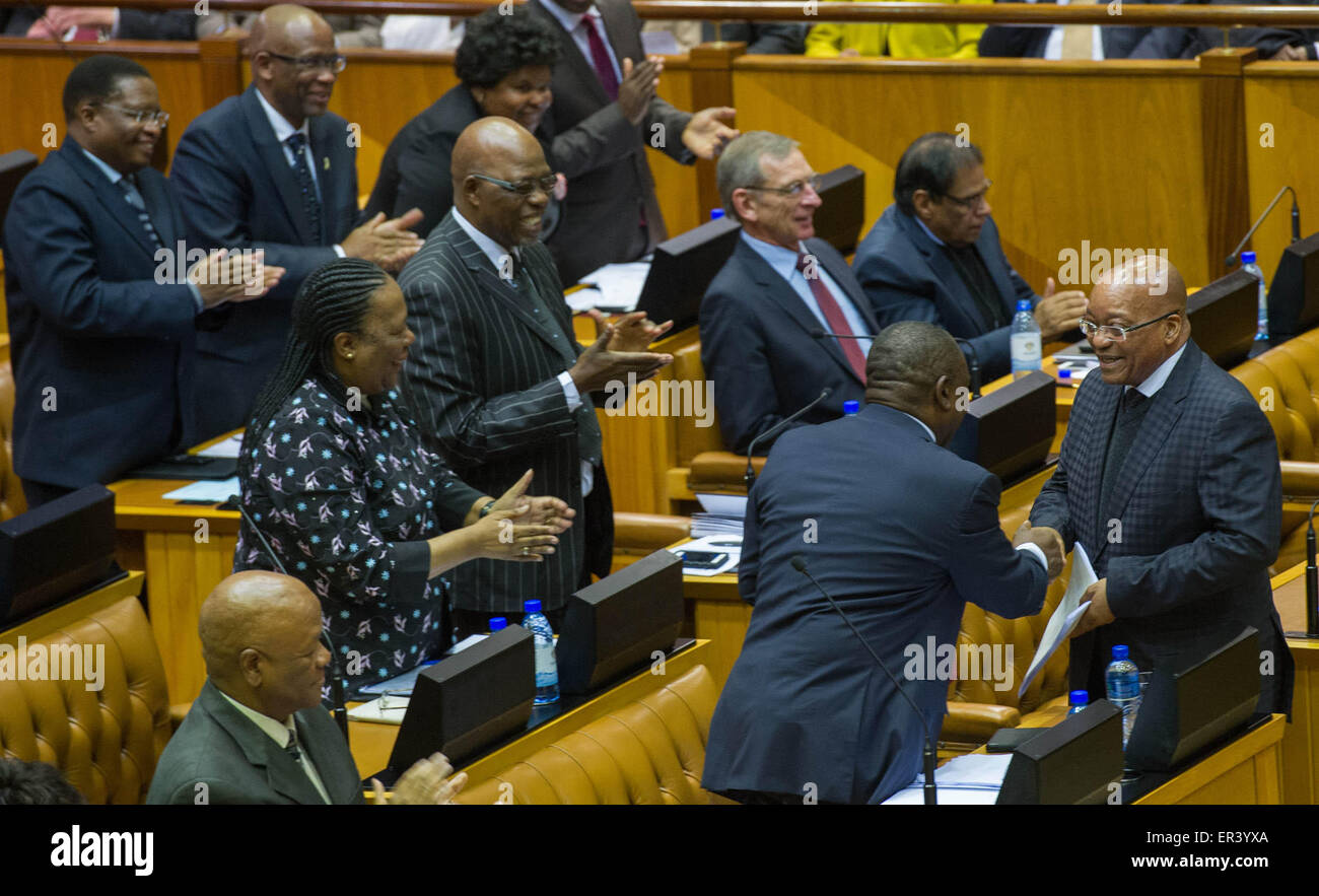 Cape Town, South Africa. 26th May, 2015. South African President Jacob Zuma (1st R) shakes hands with Vice President Cyril Ramaphosa after delivering his Presidency budget vote speech in National Assembly, Cape Town, South Africa, on May 26, 2015. South Africa is committed to building stronger, more united and cohesive communities where African nationals and citizens continue to live together in peace and harmony as one people, President Jacob Zuma said on Tuesday. Credit:  DOC/Ntswe Mokoena/Xinhua/Alamy Live News Stock Photo