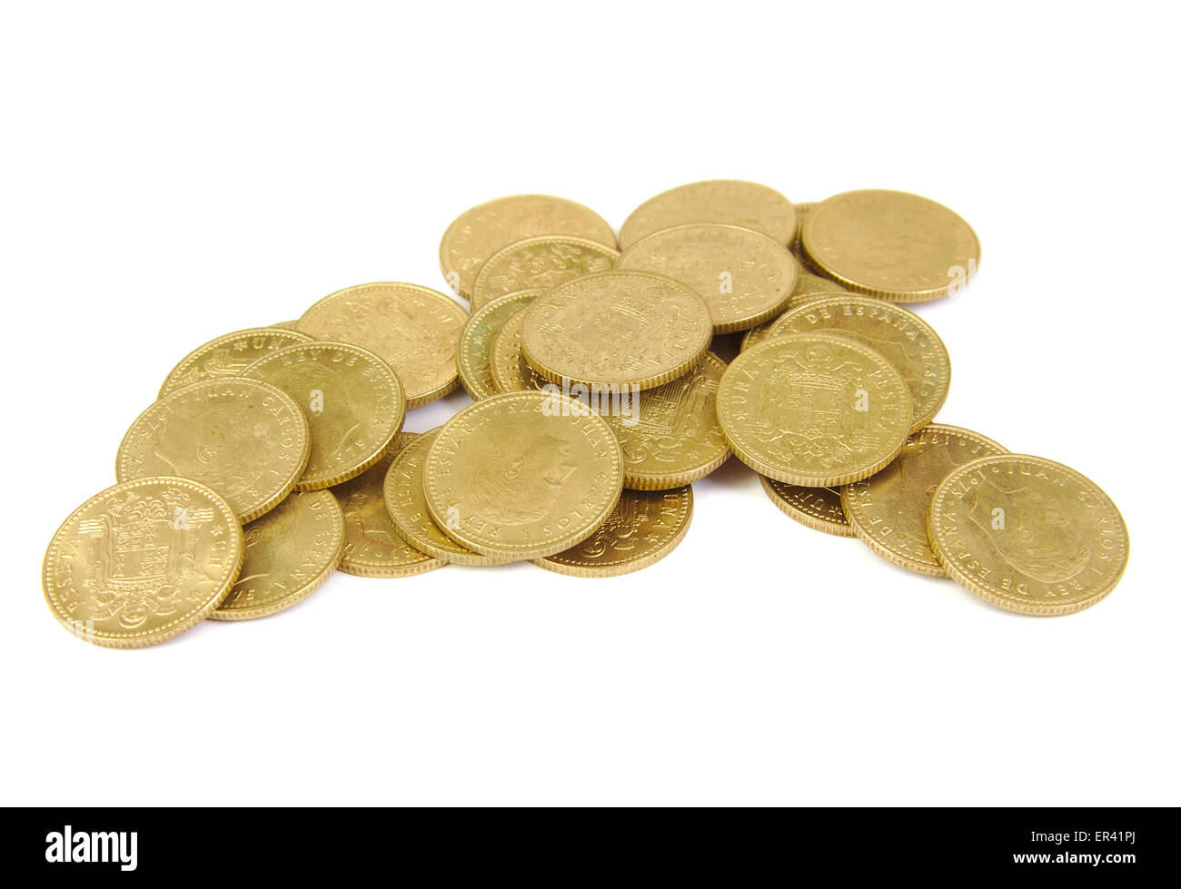 Bunch of old Spanish coins on white background. One peseta. Stock Photo