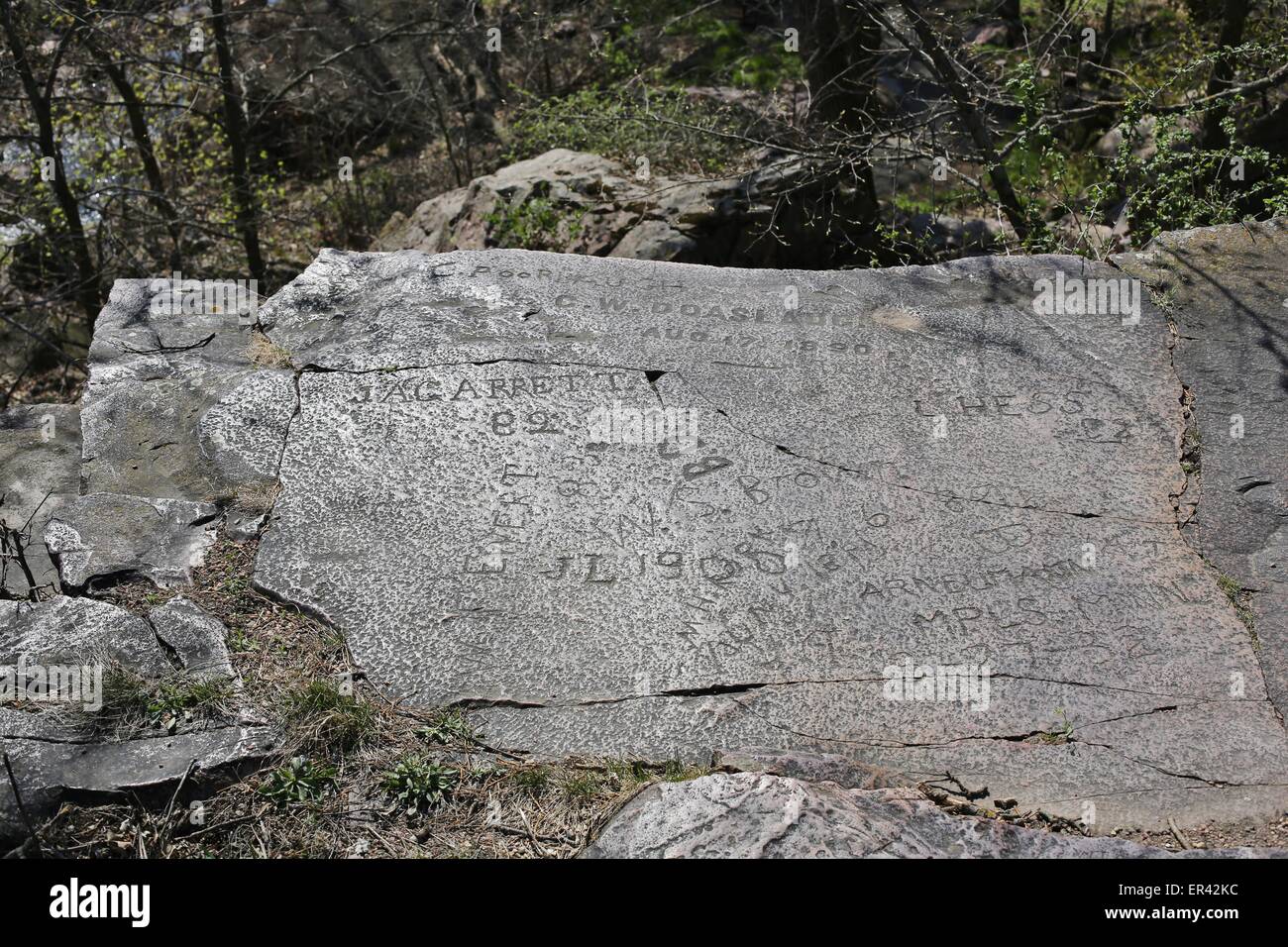 Historic carving of names into leaping rock at Pipestone National Monument in Minnesota Stock