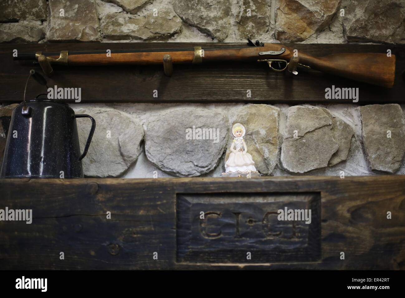 A gun above the hearth at the Laura Ingalls Wilder museum in Walnut Grove, Minnesota. Stock Photo