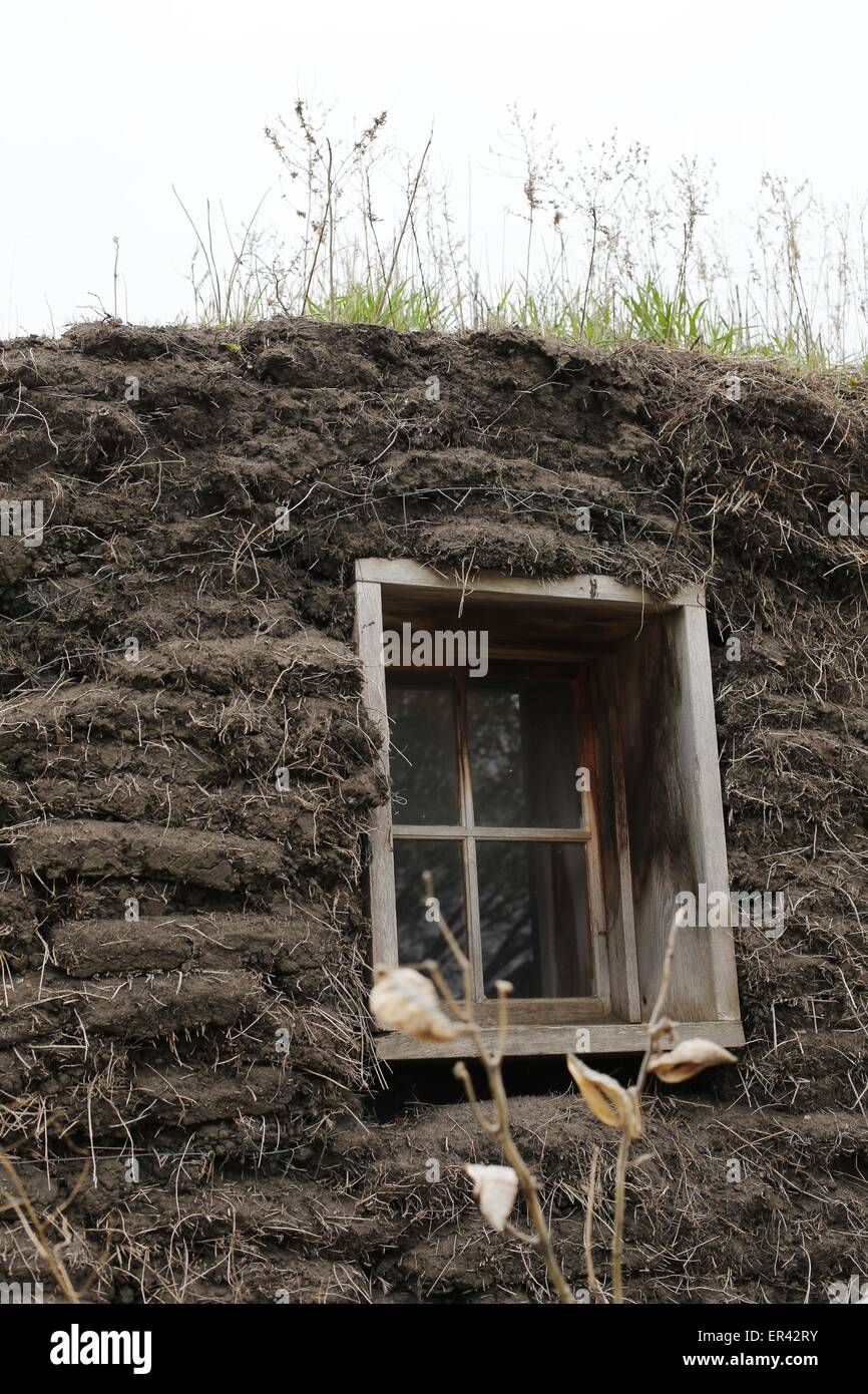 A window in a dug out home at the Laura Ingalls Wilder museum in Walnut  Grove, Minnesota Stock Photo - Alamy