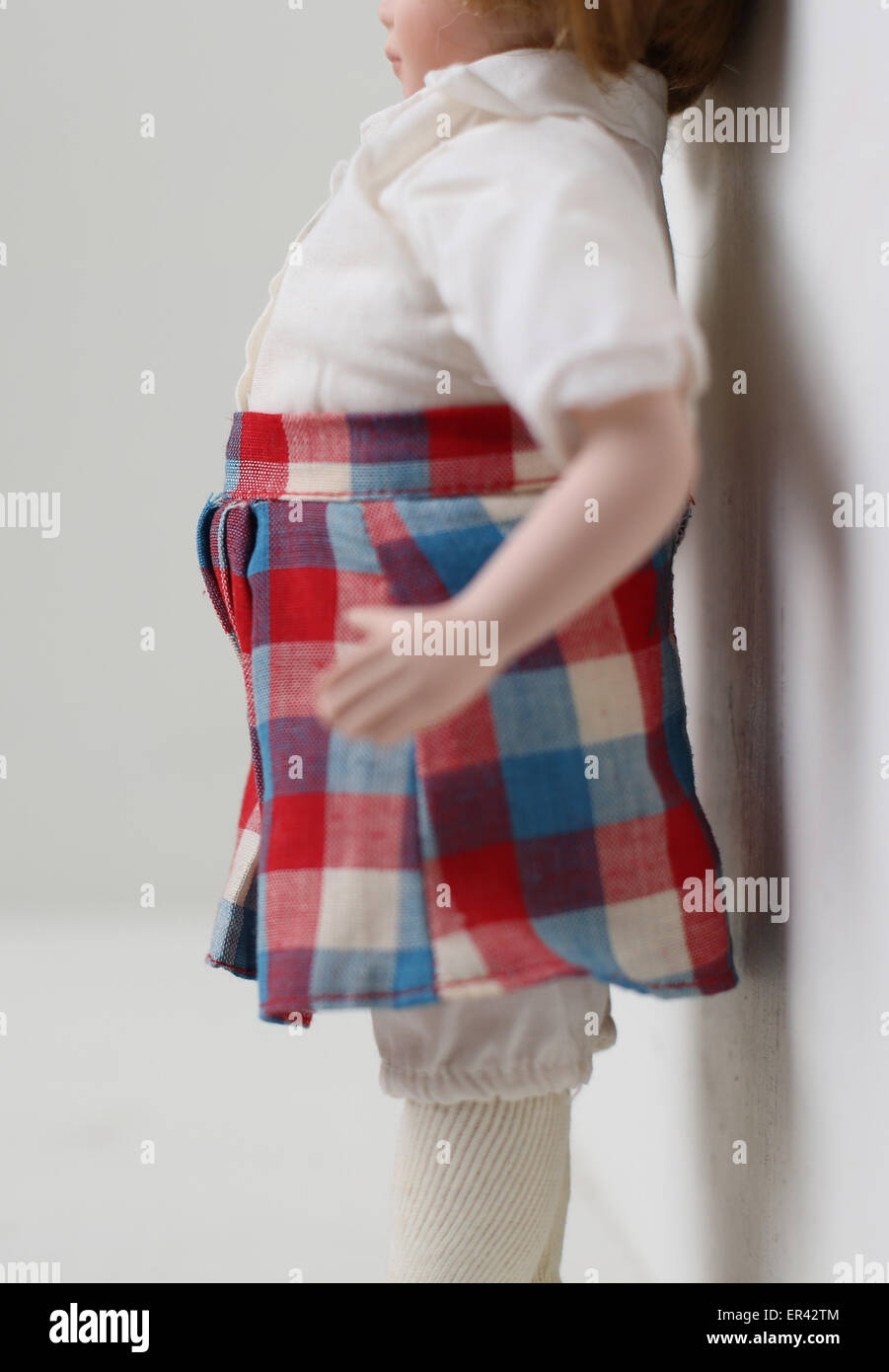 A side view of an overweight female doll. Stock Photo