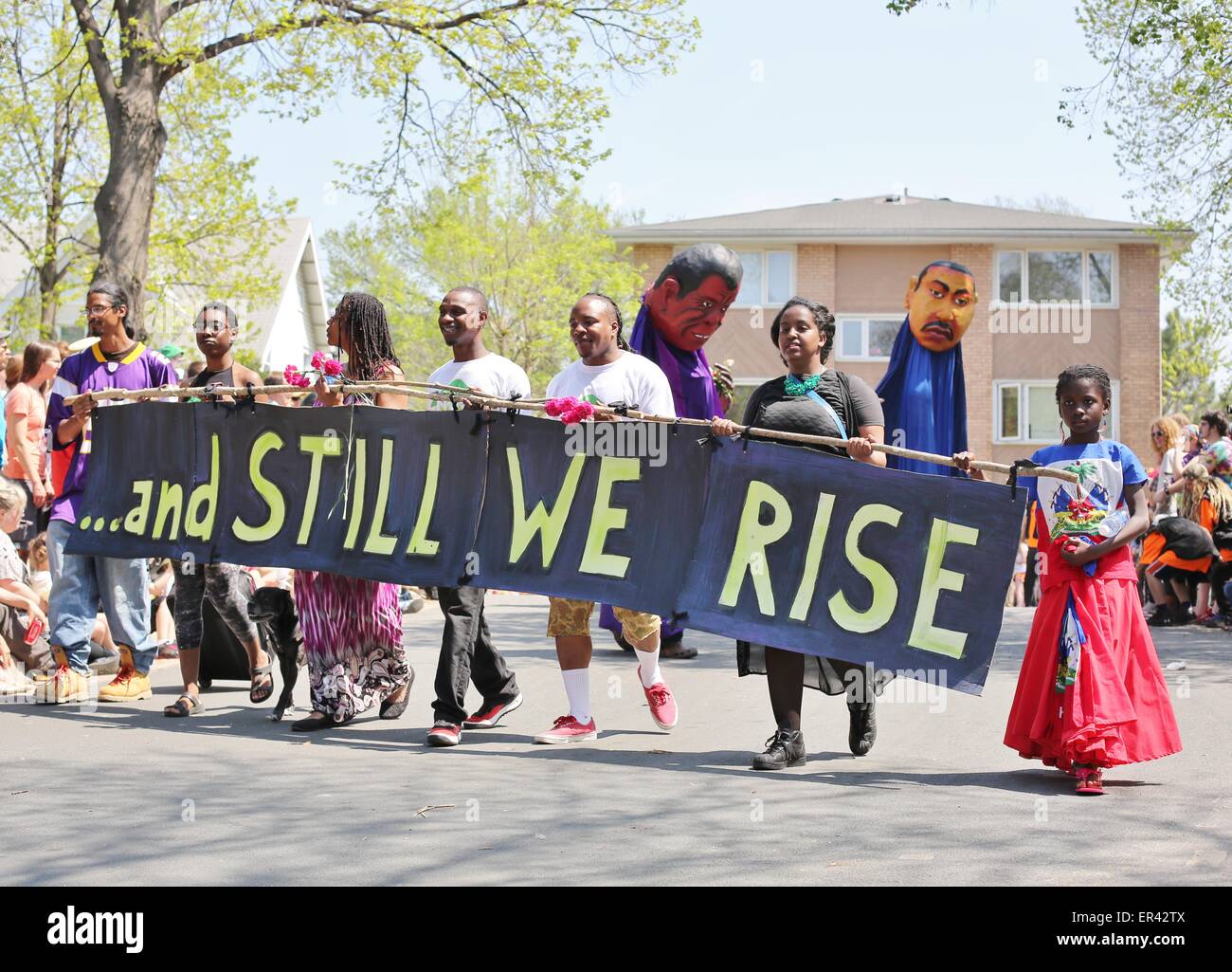 African American youth marching at the May Day parade in Minneapolis