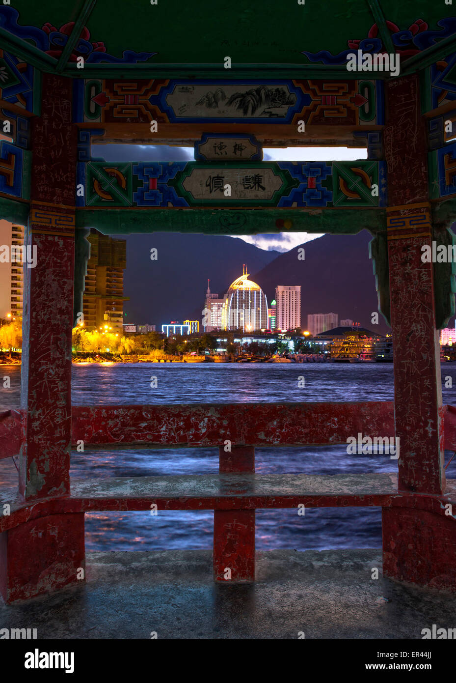 Dali, Yunnan, CHN. 5th Jan, 2015. Dali, CHINA - Jan 09 2015: (EDITORIAL USE ONLY. CHINA OUT) ï¼ˆPhoto has been processedï¼‰Erhai Lake at night. Erhai Lake is the largest highland lake next to Dianchi and one of the seven biggest fresh water lakes in China. ''Erhai'' means ''sea shaped like an ear'' in Chinese. Implying that the lake is ear shaped and as large as a sea, it was so named. The lake covers an area of 250 square kilometers and is located about 2 kilometers east of Dali. It is like a crescent lying between Cangshan and Dali city as seen from Cangshan Mount. In a sunny day, the cryst Stock Photo