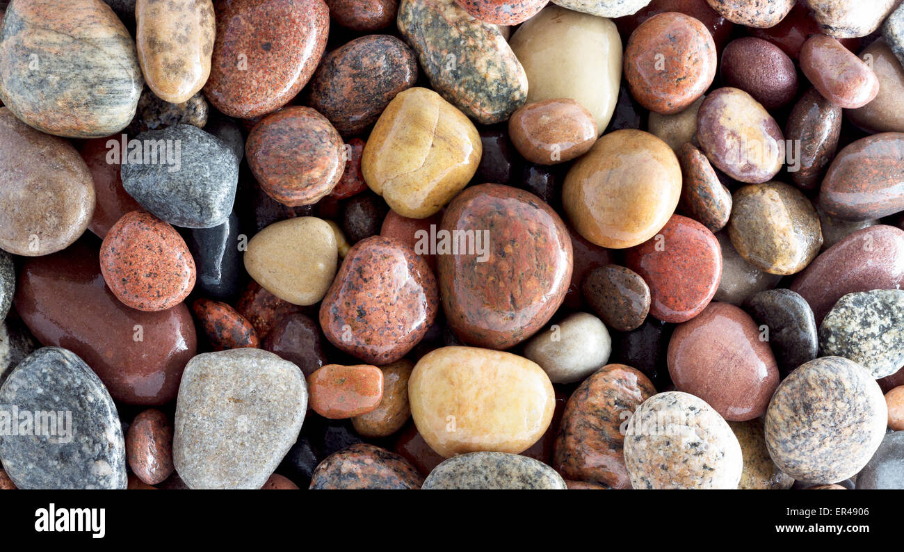 Sea stones background Stock Photo - Alamy