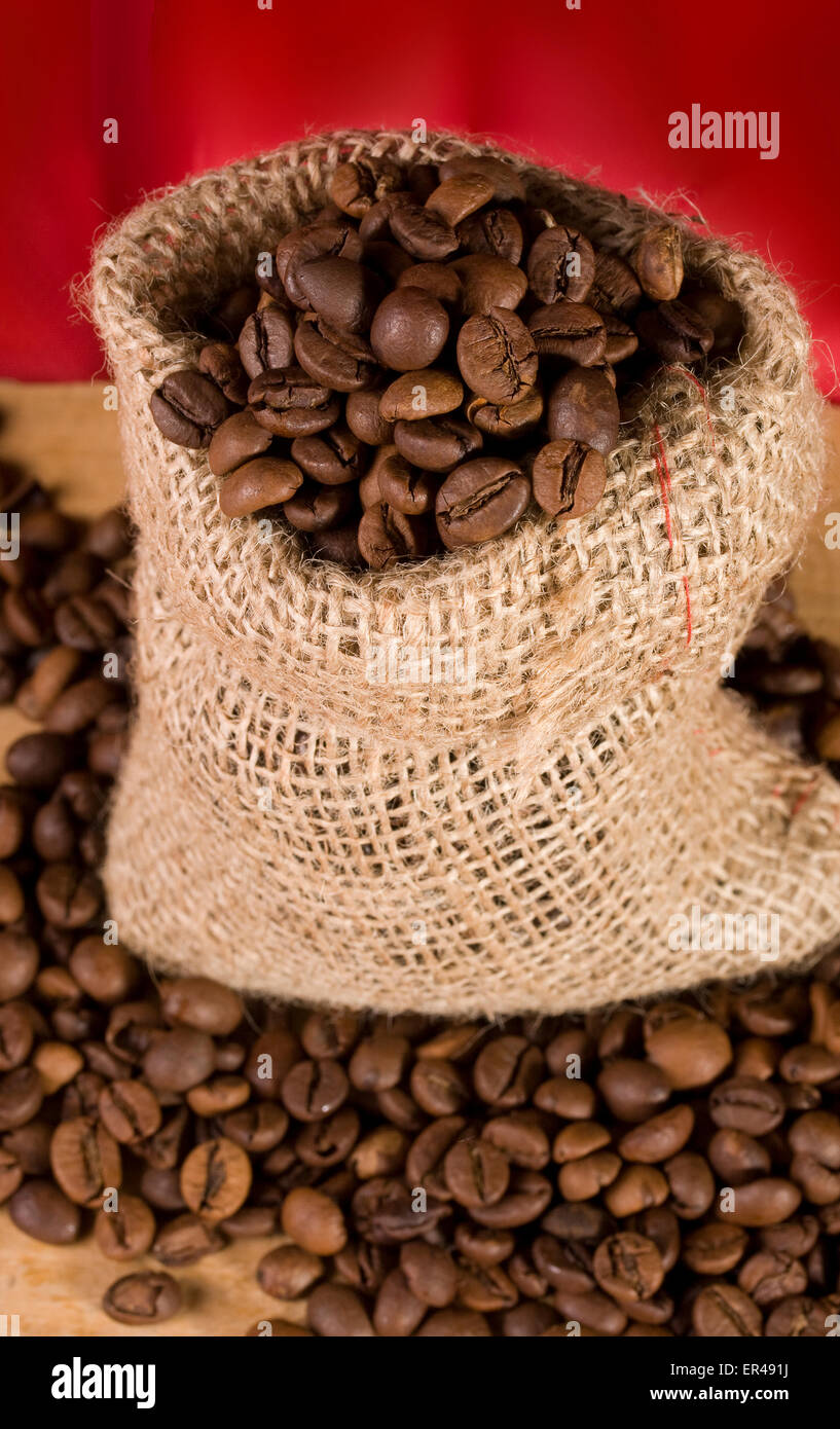 bag of coffee on red background Stock Photo