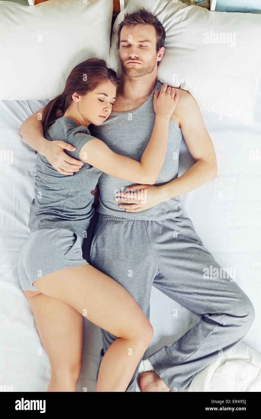 Young couple napping together Stock Photo