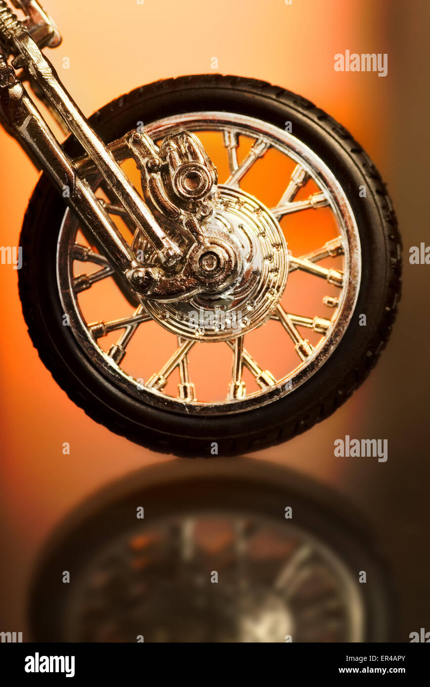 Motorcycle wheel on abstract background Stock Photo - Alamy