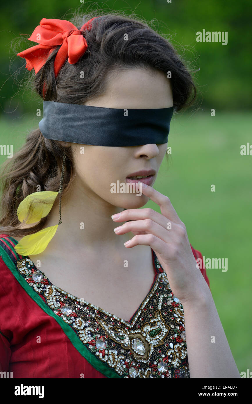Hispanic female blindfolded Stock Photos - Page 1 : Masterfile