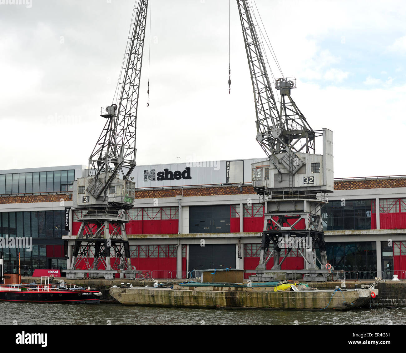 Two of the preserved steam cranes outside the M Shed museum in Bristol ...