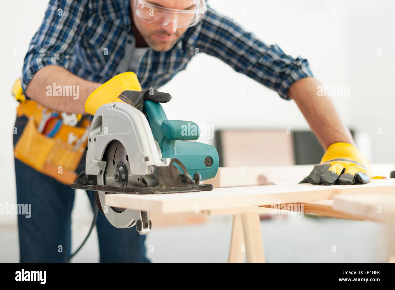 Carpenter working with circular saw. Pilzno, Poland Stock Photo Alamy