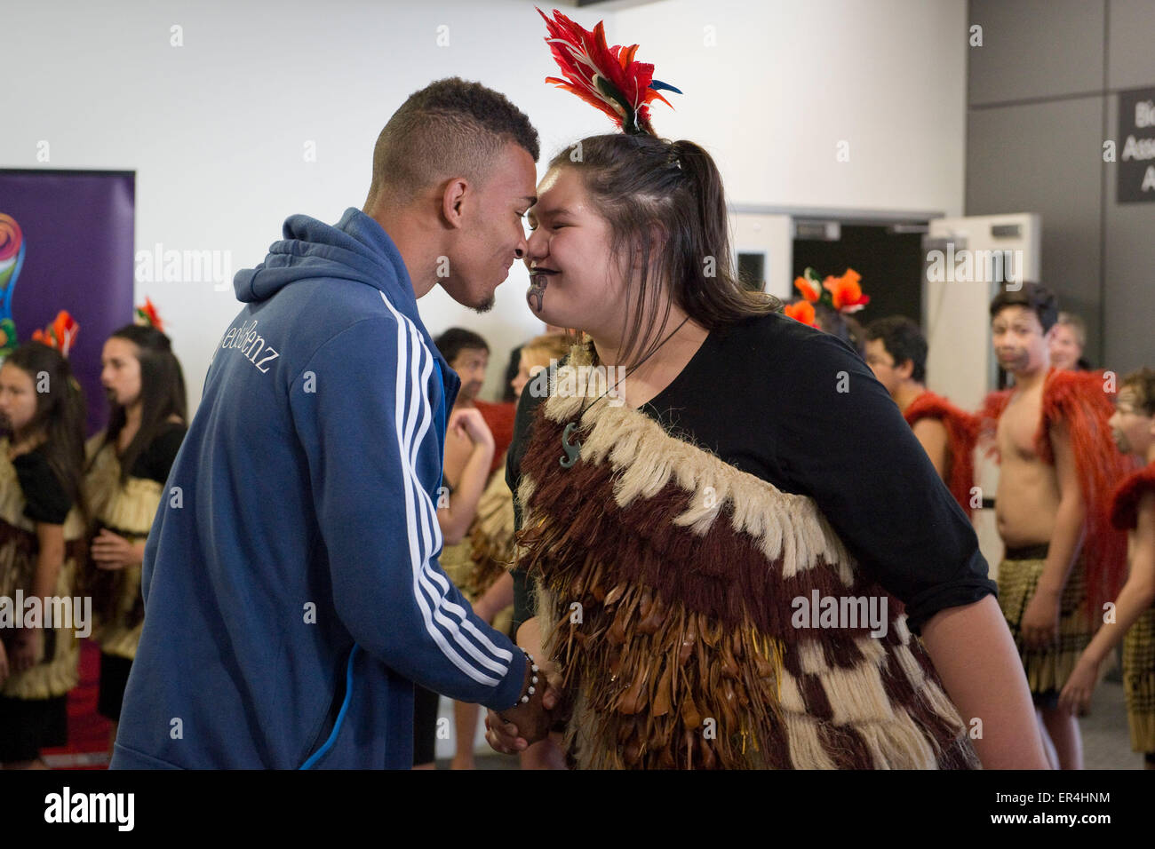 Christchurch, New Zealand. 27th May, 2015. Christchurch, New Zealand - May 27, 2015 - Team captain Kevin Akpoguma of Germany is being welcomed with a traditional Hongi by a Kapa Haka group upon his arrival at Christchurch International Airport ahead of the FIFA U20 World Cup on May 27, 2015 in Christchurch, New Zealand. Credit:  dpa/Alamy Live News Stock Photo