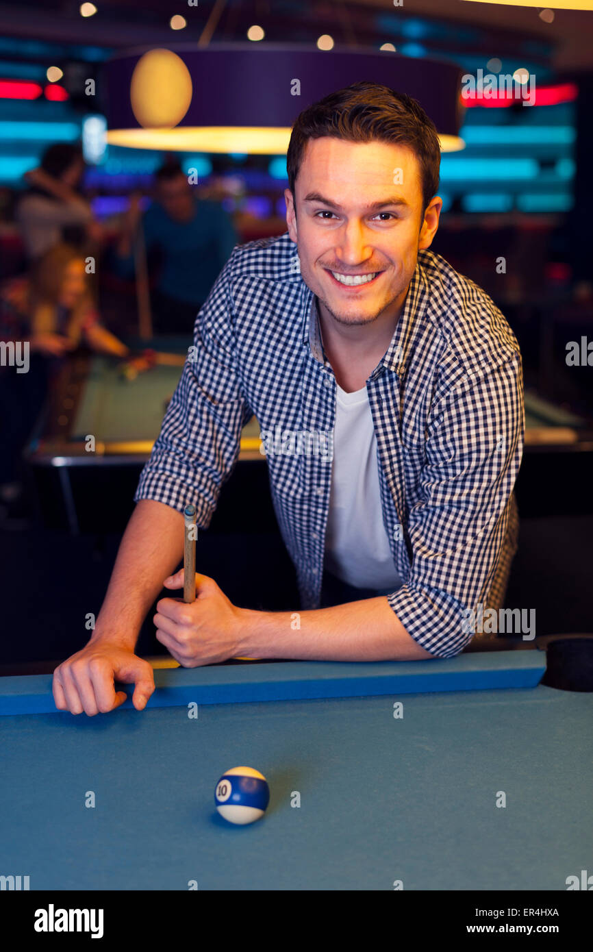 Friends playing pool at a bar Stock Photo Alamy