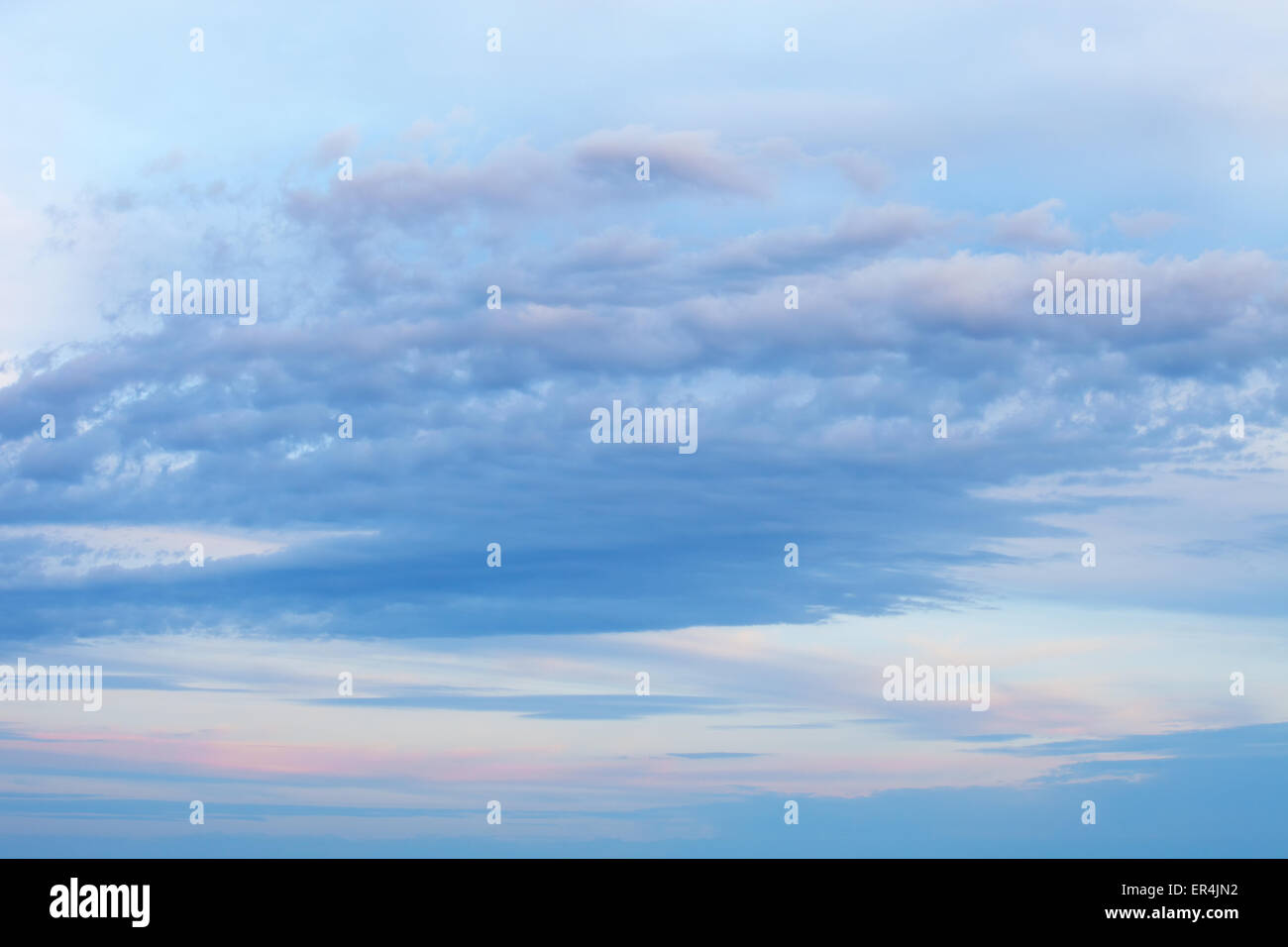 sky background with a nice sunset clouds Stock Photo - Alamy