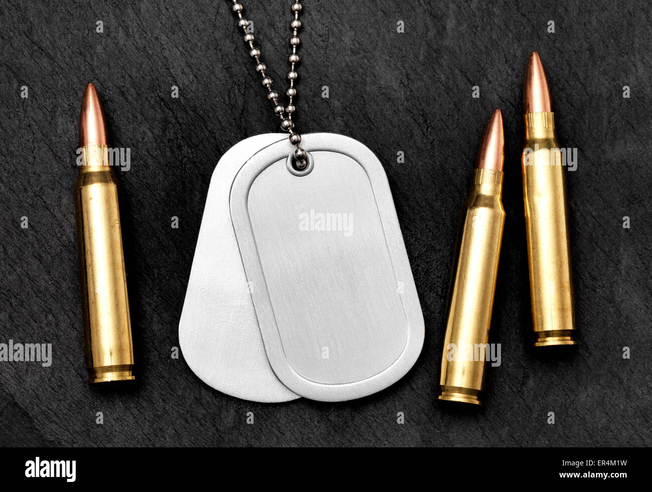 Isolated Dog Tag with bullets Stock Photo Alamy