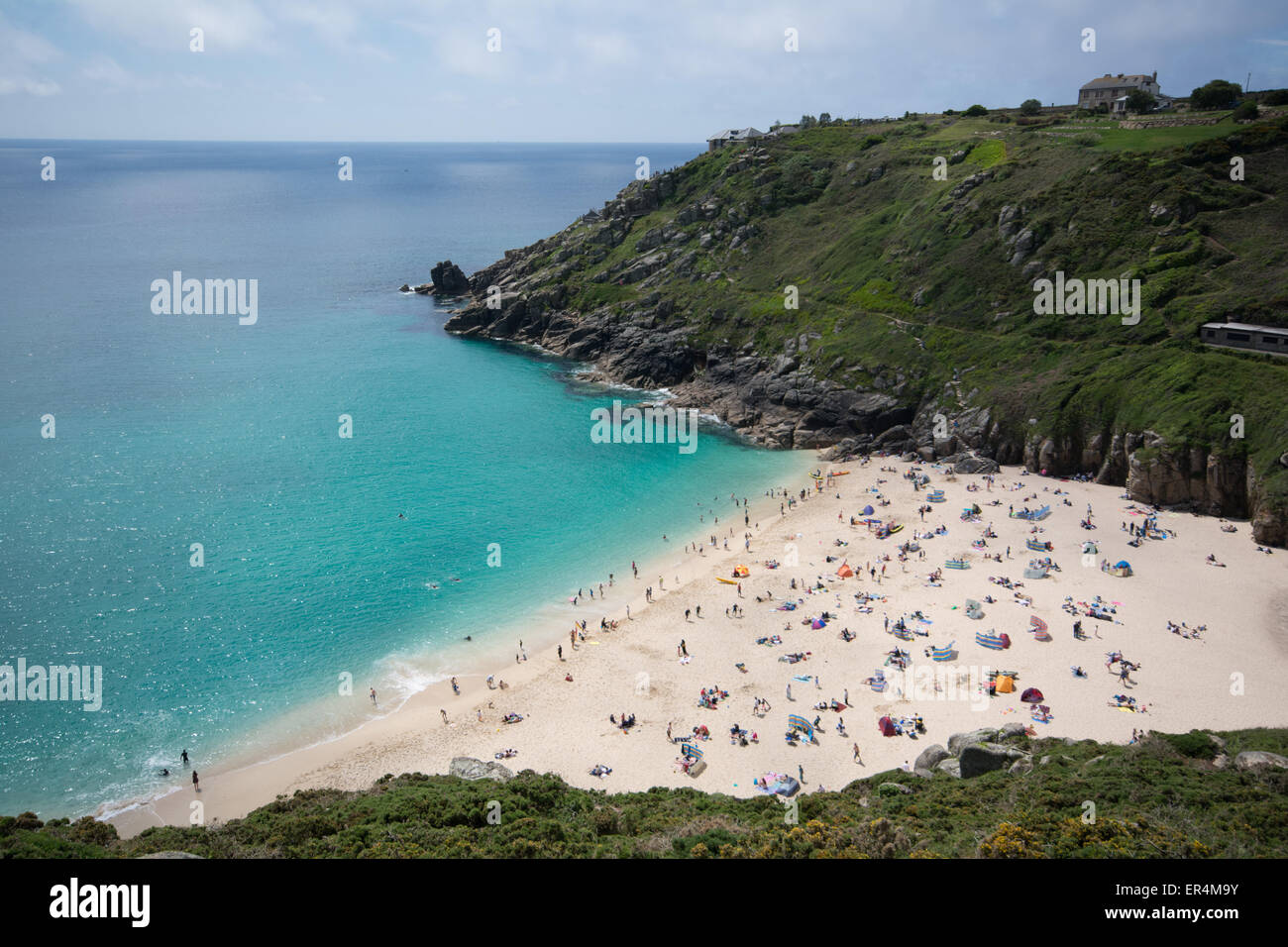 Porthcurno, Cornwall, UK. 27th May 2015. UK Weather. Hot and sunny bank holiday for visitors to Porthcurno beach. Credit:  Simon Yates/Alamy Live News Stock Photo