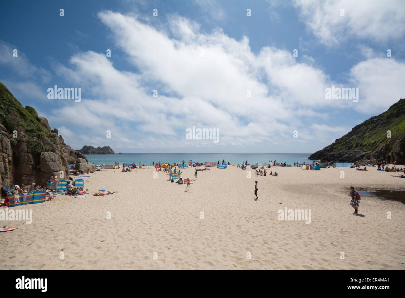Porthcurno, Cornwall, UK. 27th May 2015. UK Weather. Hot and sunny bank holiday for visitors to Porthcurno beach. Credit:  Simon Yates/Alamy Live News Stock Photo